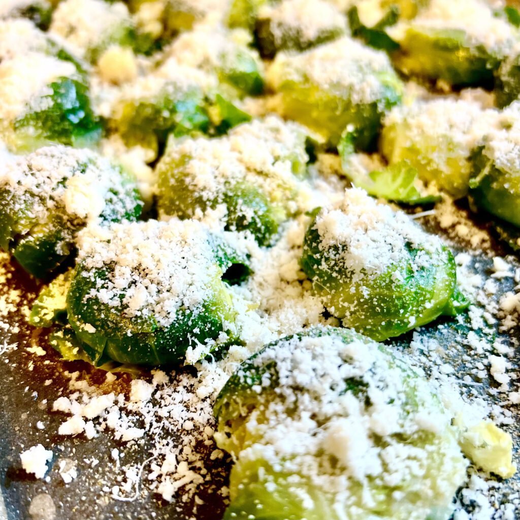 Smashed Brussels Sprouts with Parmigiano ready to bake.